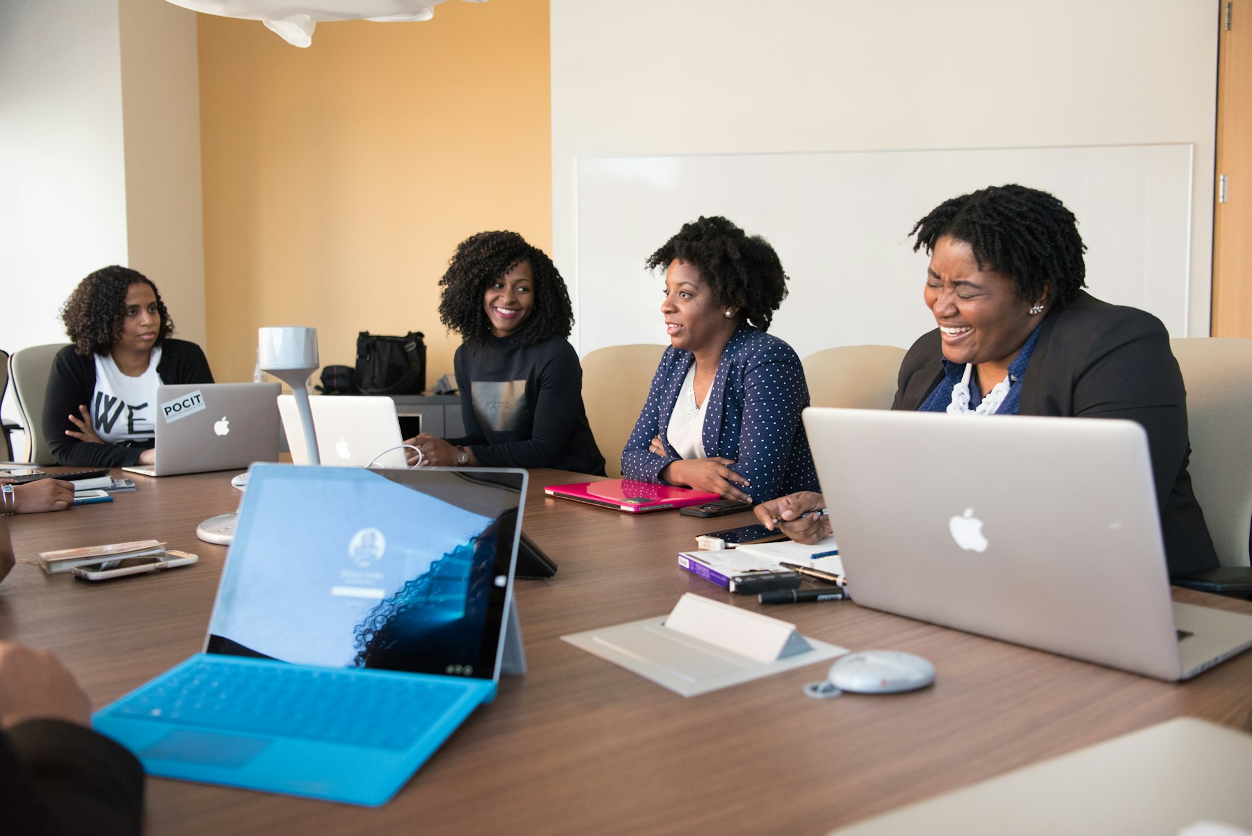 Black professionals sharing ideas in a collaborative working session